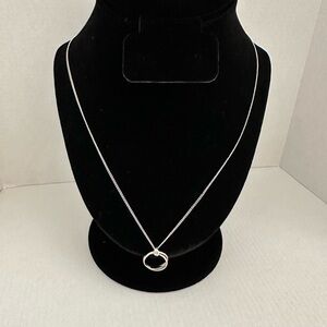 Silver tone interlocking rings necklace